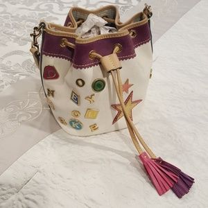 Dooney and Bourke mini draw string bag. Never used